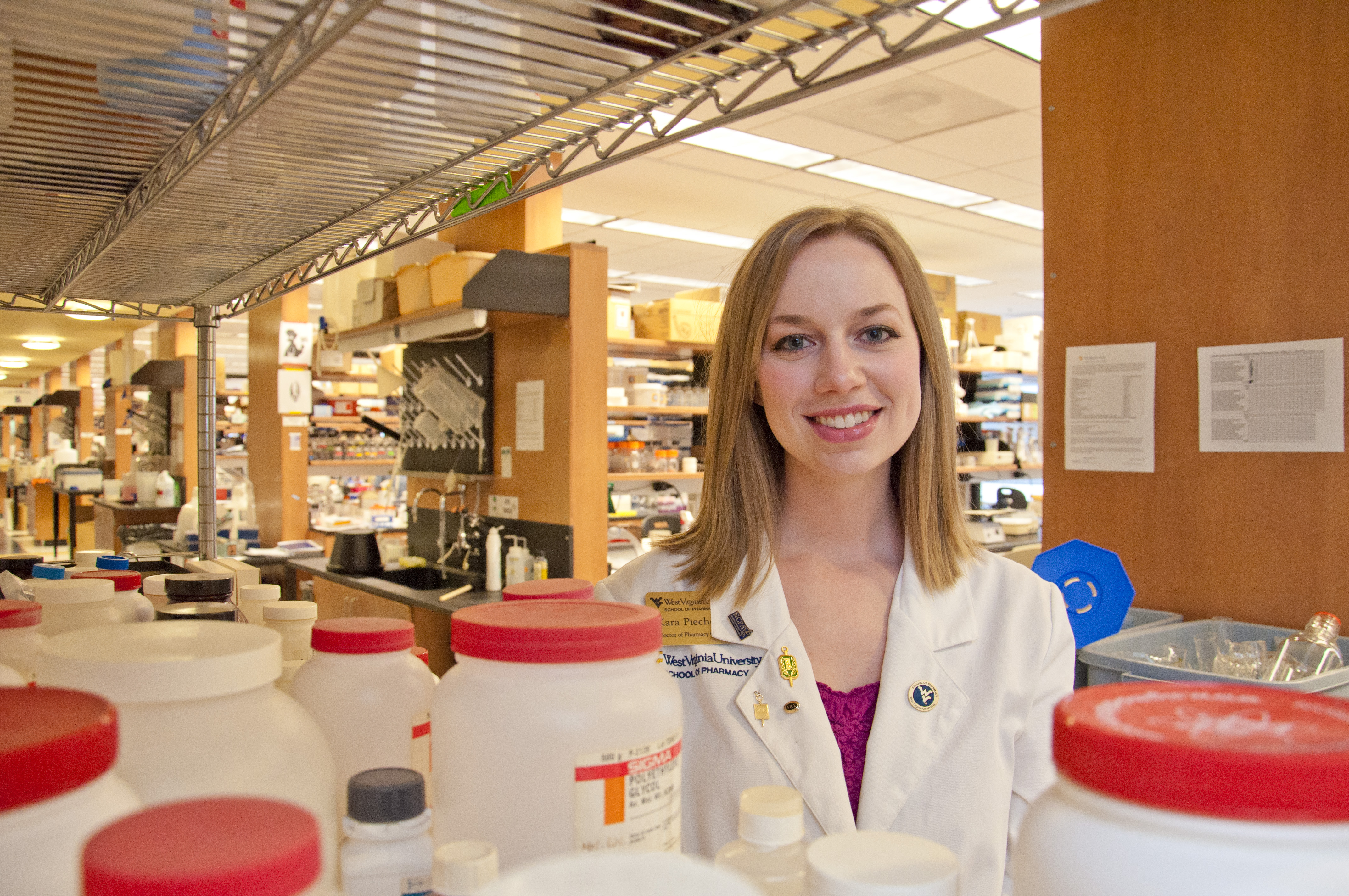 Kara in a pharmacy lab